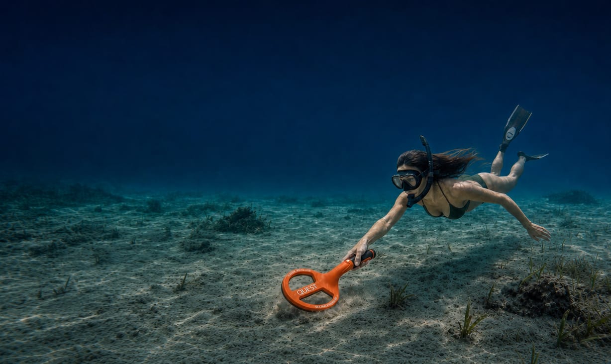 Diver using an orange QUEST Scuba Tector underwater